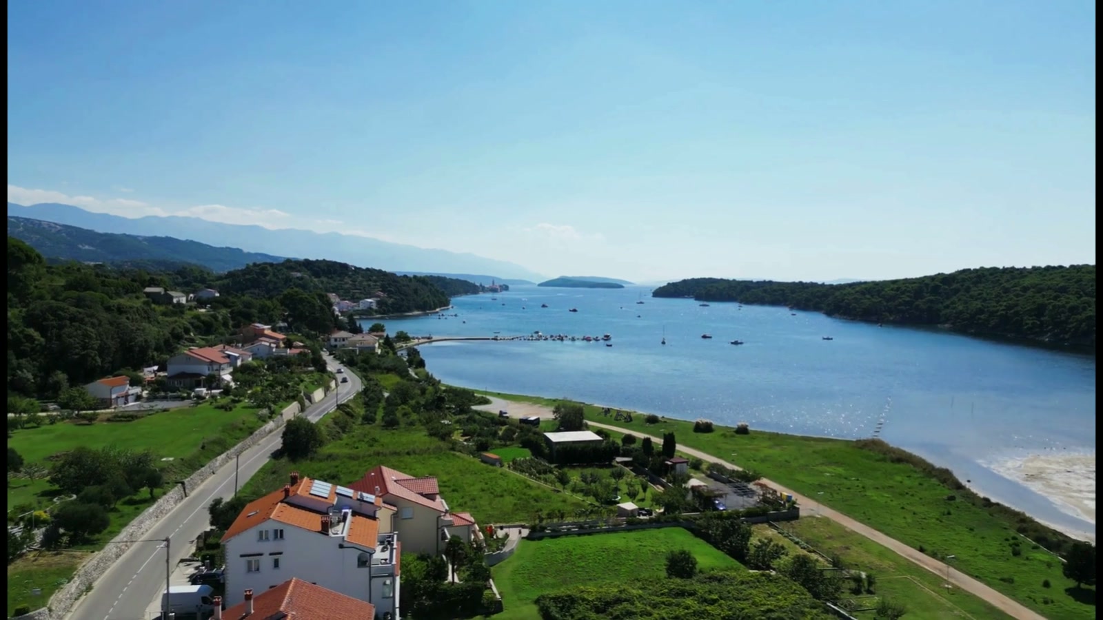 Kampor bay and the green coastline of Rab